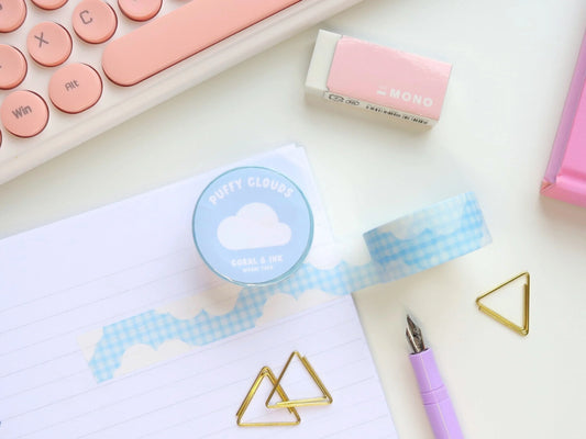 This super adorable washi tape features little puffy clouds on a blue gingham backdrop.  It's the perfect washi tape to use for borders on your journal spreads or to decorate your stationery and other personal items!  Approx dimensions: 20mm x 10m