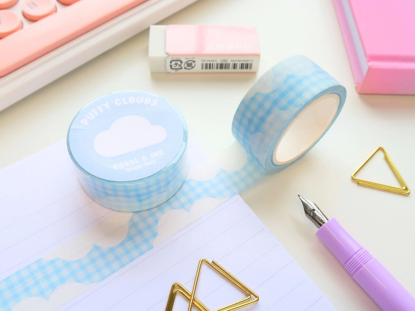 This super adorable washi tape features little puffy clouds on a blue gingham backdrop.  It's the perfect washi tape to use for borders on your journal spreads or to decorate your stationery and other personal items!  Approx dimensions: 20mm x 10m