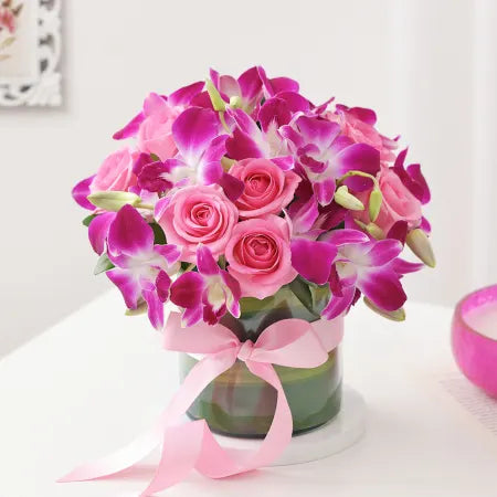 Purple Orchids & Pink Roses In Round Vase