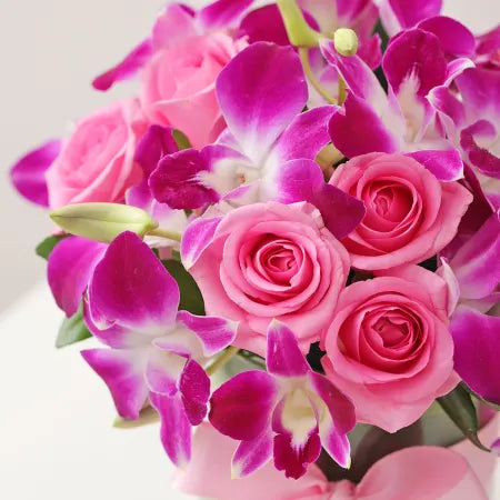 Purple Orchids & Pink Roses In Round Vase